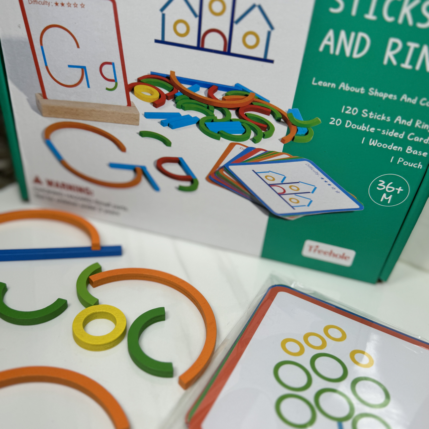 Juego educativo "Sticks and Rings" Aprendiendo con formas, figuras y colores.